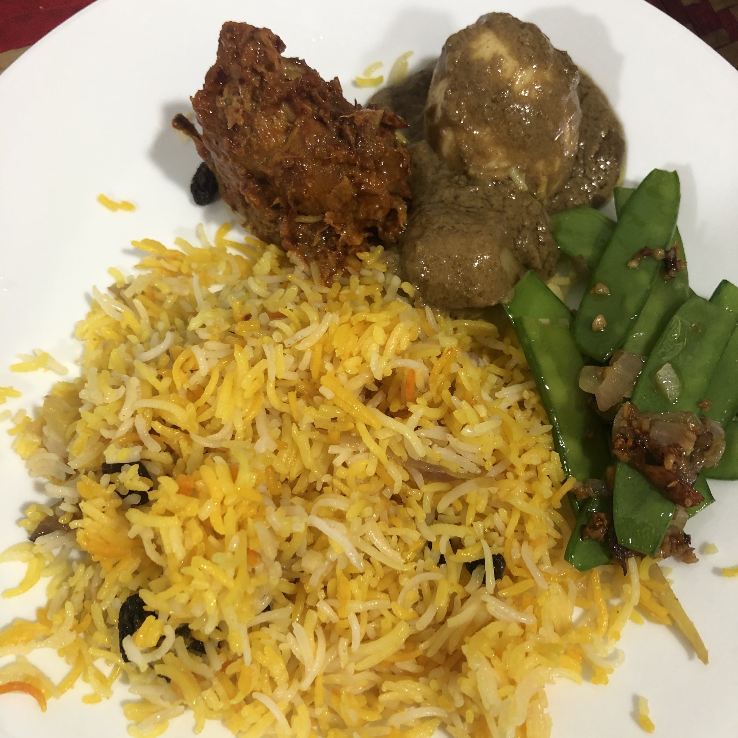 Butter Rice with Ayam Masak Merah, Chicken Korma and Mixed Vegetables